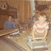 John Cooper (right) with neighbor John Schroeder getting typewriters ready for the schools in 1971.