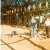 Working on the new building in 1979. Lee Cooper digs while Rob Cooper and his sister Connie Cooper look on.